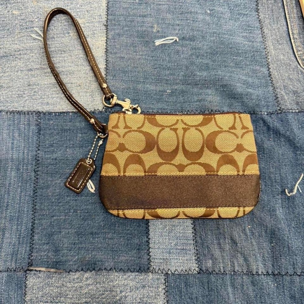 Coach brown wristlet with wrist strap